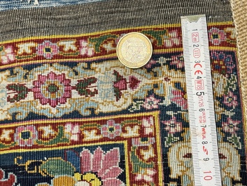 An exceptional and large embroidered silk 'Shahnameh' carpet, signed Musa Baft Tabriz, Tabriz, Iran, 20th C.