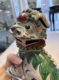 A pair of Chinese verte biscuit models of Buddhist lions, 18th C.