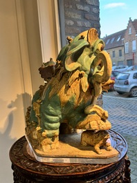 A pair of large Chinese polychrome-glazed Shiwan stoneware Buddhist lions, 19th C.