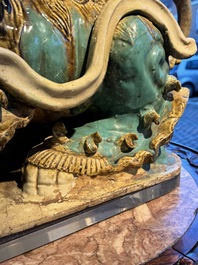 A pair of large Chinese polychrome-glazed Shiwan stoneware Buddhist lions, 19th C.