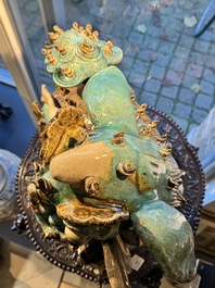 A pair of large Chinese polychrome-glazed Shiwan stoneware Buddhist lions, 19th C.