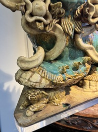 A pair of large Chinese polychrome-glazed Shiwan stoneware Buddhist lions, 19th C.