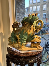 A pair of large Chinese polychrome-glazed Shiwan stoneware Buddhist lions, 19th C.