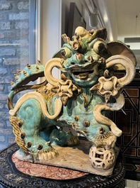 A pair of large Chinese polychrome-glazed Shiwan stoneware Buddhist lions, 19th C.