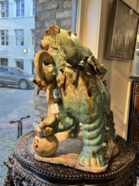 A pair of large Chinese polychrome-glazed Shiwan stoneware Buddhist lions, 19th C.