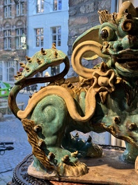 A pair of large Chinese polychrome-glazed Shiwan stoneware Buddhist lions, 19th C.