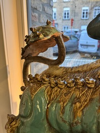 A pair of large Chinese polychrome-glazed Shiwan stoneware Buddhist lions, 19th C.