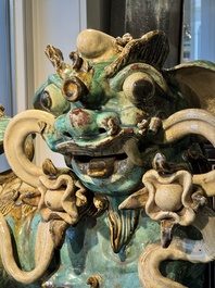 A pair of large Chinese polychrome-glazed Shiwan stoneware Buddhist lions, 19th C.