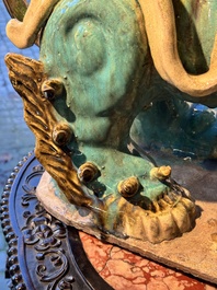 A pair of large Chinese polychrome-glazed Shiwan stoneware Buddhist lions, 19th C.