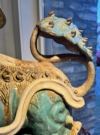 A pair of large Chinese polychrome-glazed Shiwan stoneware Buddhist lions, 19th C.