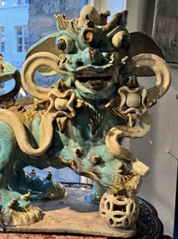 A pair of large Chinese polychrome-glazed Shiwan stoneware Buddhist lions, 19th C.