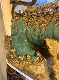 A pair of large Chinese polychrome-glazed Shiwan stoneware Buddhist lions, 19th C.