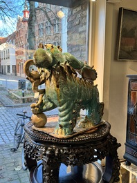 A pair of large Chinese polychrome-glazed Shiwan stoneware Buddhist lions, 19th C.