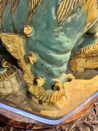 A pair of large Chinese polychrome-glazed Shiwan stoneware Buddhist lions, 19th C.