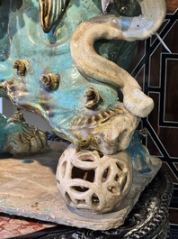 A pair of large Chinese polychrome-glazed Shiwan stoneware Buddhist lions, 19th C.