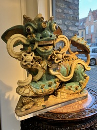 A pair of large Chinese polychrome-glazed Shiwan stoneware Buddhist lions, 19th C.