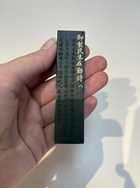 A set of eight Chinese 'Yu Zhi Min Sheng Zai Qin Shi 御製民生在勤詩' ink cakes with a gilt-lacquered 'dragon' box, Hu Kaiwen 胡開文 mark, 20th C.