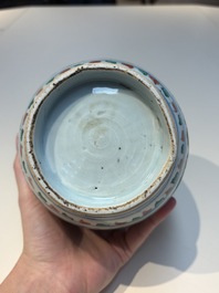 A Chinese wucai &lsquo;Buddhist Lion&rsquo; vase and cover, Transitional period