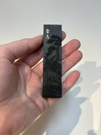 A set of eight Chinese 'Yu Zhi Min Sheng Zai Qin Shi 御製民生在勤詩' ink cakes with a gilt-lacquered 'dragon' box, Hu Kaiwen 胡開文 mark, 20th C.