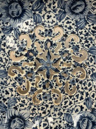 A fine blue and white Dutch Delft strawberry strainer and stand, 18th C.