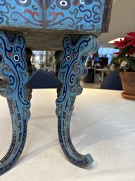 A pair of Chinese cloisonn&eacute; 'Fangding' censers and covers with Taotie design on carved wooden stands, 19th C.