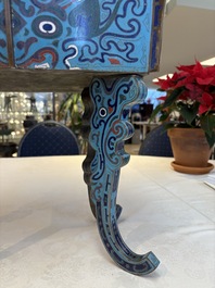 A pair of Chinese cloisonn&eacute; 'Fangding' censers and covers with Taotie design on carved wooden stands, 19th C.