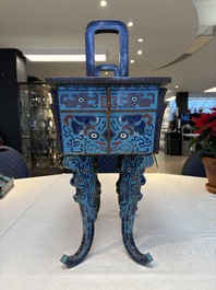 A pair of Chinese cloisonn&eacute; 'Fangding' censers and covers with Taotie design on carved wooden stands, 19th C.