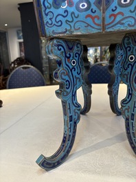 A pair of Chinese cloisonn&eacute; 'Fangding' censers and covers with Taotie design on carved wooden stands, 19th C.