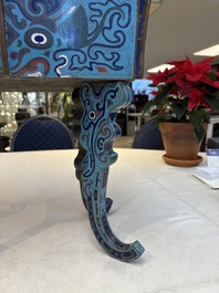 A pair of Chinese cloisonn&eacute; 'Fangding' censers and covers with Taotie design on carved wooden stands, 19th C.