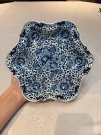 A fine blue and white Dutch Delft strawberry strainer and stand, 18th C.