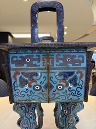 A pair of Chinese cloisonn&eacute; 'Fangding' censers and covers with Taotie design on carved wooden stands, 19th C.