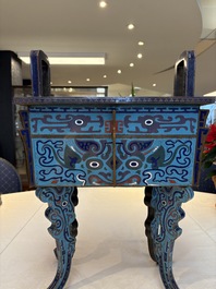 A pair of Chinese cloisonn&eacute; 'Fangding' censers and covers with Taotie design on carved wooden stands, 19th C.