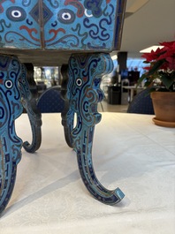 A pair of Chinese cloisonn&eacute; 'Fangding' censers and covers with Taotie design on carved wooden stands, 19th C.