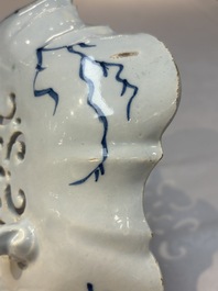 A fine blue and white Dutch Delft strawberry strainer and stand, 18th C.