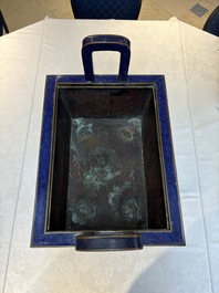 A pair of Chinese cloisonn&eacute; 'Fangding' censers and covers with Taotie design on carved wooden stands, 19th C.