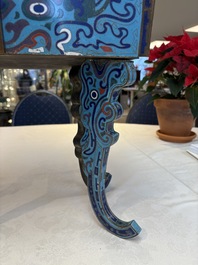 A pair of Chinese cloisonn&eacute; 'Fangding' censers and covers with Taotie design on carved wooden stands, 19th C.
