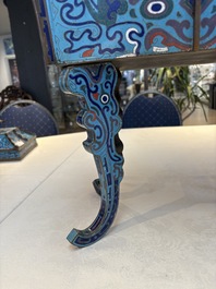 A pair of Chinese cloisonn&eacute; 'Fangding' censers and covers with Taotie design on carved wooden stands, 19th C.