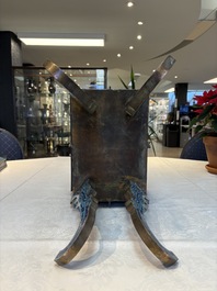 A pair of Chinese cloisonn&eacute; 'Fangding' censers and covers with Taotie design on carved wooden stands, 19th C.