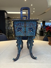 A pair of Chinese cloisonn&eacute; 'Fangding' censers and covers with Taotie design on carved wooden stands, 19th C.