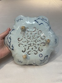 A fine blue and white Dutch Delft strawberry strainer and stand, 18th C.