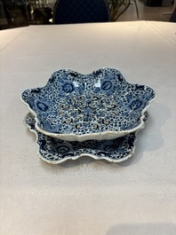 A fine blue and white Dutch Delft strawberry strainer and stand, 18th C.