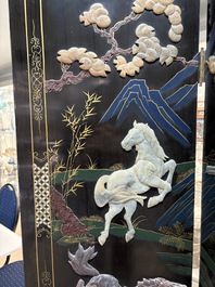 A Chinese precious-stone-inset gilt-lacquered four-panel 'Ba Jun Tu 八骏图' folding screen, 20th C.