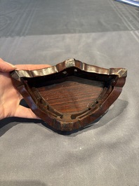 A collection of 38 Chinese wooden stands and a box, 19/20th C.