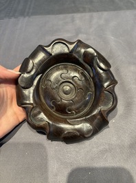 A collection of 38 Chinese wooden stands and a box, 19/20th C.