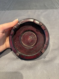 A collection of 38 Chinese wooden stands and a box, 19/20th C.