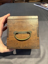 A collection of 38 Chinese wooden stands and a box, 19/20th C.