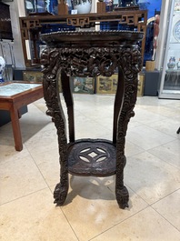Two finely carved Chinese marble-topped hongmu stands, 19th C.
