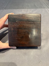 A collection of 38 Chinese wooden stands and a box, 19/20th C.