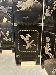 A Chinese precious-stone-inset gilt-lacquered four-panel 'Ba Jun Tu 八骏图' folding screen, 20th C.