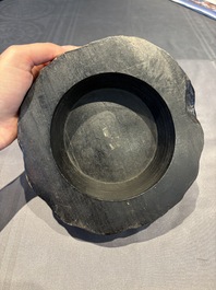 A collection of 38 Chinese wooden stands and a box, 19/20th C.